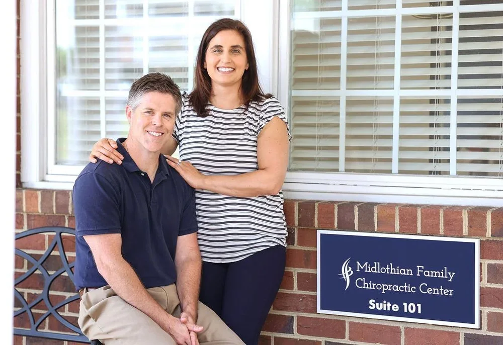 Dr. Ryan Heid and Dr. Kate Brus outside the Midlothian practice