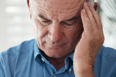 Person with headache discomfort