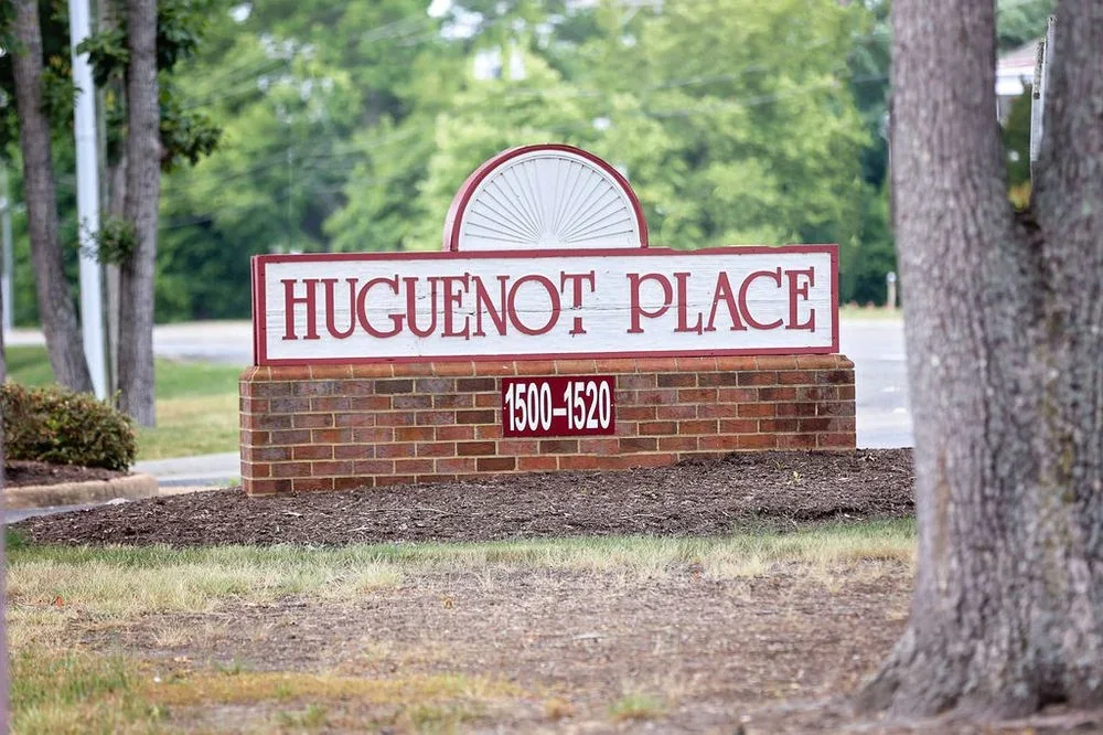 Huguenot Place roadside sign at the practice’s office complex