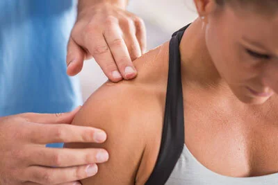 Person experiencing neck discomfort